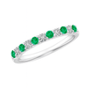 Emerald and diamond half eternity ring